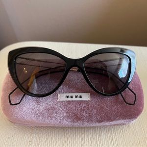 Miu Miu Cat eye Sunglasses